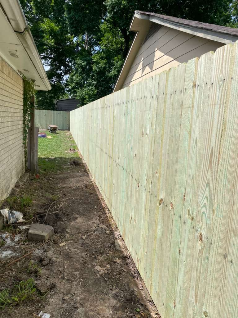 New wood side-yard privacy fence installed on the Northshore