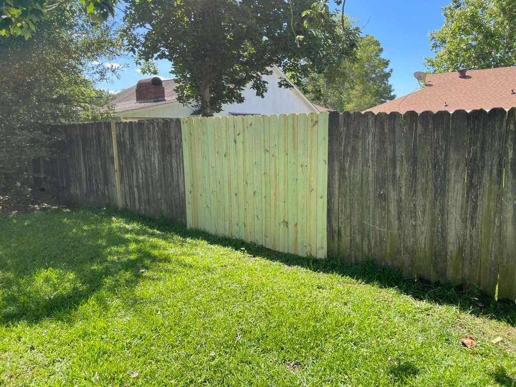 New section built into an older wood fence